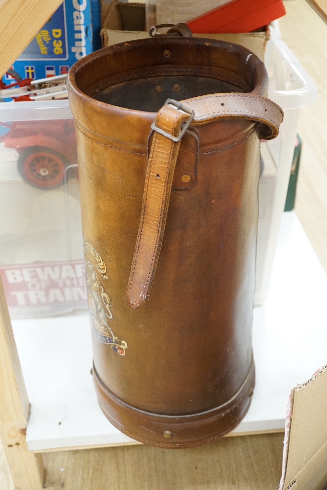 A brown leather hod carrier